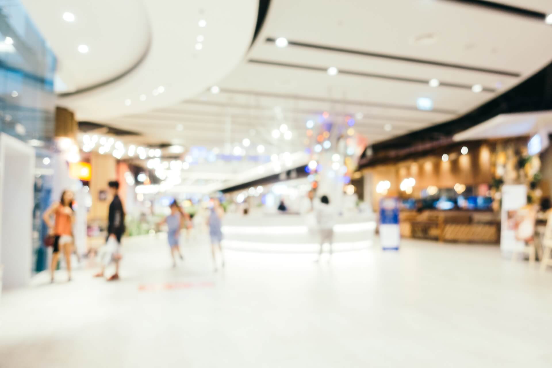 abstract-blur-bokeh-defocused-shopping-mall-interior-department-store